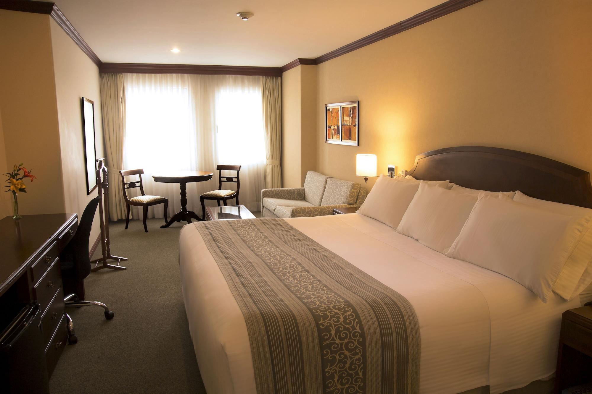 Hotel Dann Carlton ボゴタ エクステリア 写真 A room at the hotel